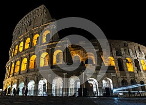 Architectural Sights of The Roman Colosseum (Colosseo Romano) in Rome, Lazio Province, Italy. (At Night).