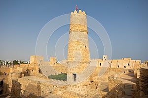 Architectural structures and watchtower of fortified Ribat of Monastir in Tunisia photo