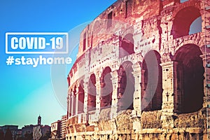 Architecture and arches of the Colosseum in Rome, ItalyArchitecture and arches of the Colosseum in Rome, Italy with sign  stayhome photo