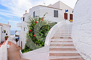 Architecture of Binibeca Nou, a traditional Spanish fishing village on the coast of Menorca.