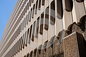 Architecture in brutalism style. Concrete building against sky Postwar modernism