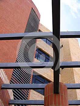 Architecture and building construction with structural steel and red bricks.