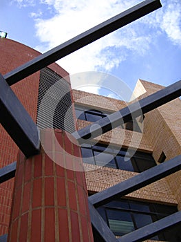 Architecture and building construction with structural steel and red bricks.
