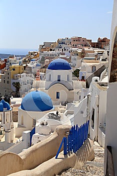 Architecture churches in Santorini with a wiew over the town.