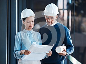 Architecture, civil and architect engineers busy with a floor plan or blueprint strategy on paper inside a office