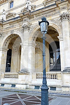 Architecture with columns and light post, Paris, France