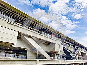 Architecture construction of elevator, escalator stairs and sky walk way, walk bridge between sky train station and department sto