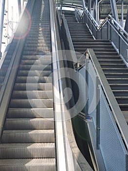 Architecture construction of elevator, escalator stairs and sky walk way, walk bridge between sky train station and department