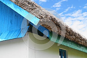 Architecture detail of an house with reed roof from Tulcea, Romania