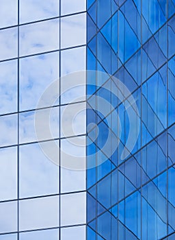 Architecture details Modern building Glass facade Reflection