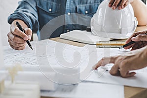 Architecture Engineer Teamwork Meeting, Drawing and working for architectural project and engineering tools on workplace, concept