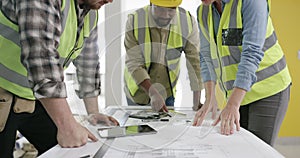 Architecture, floor plan and people with teamwork for construction site ideas, sketch and building development. Project