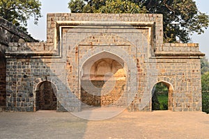 A architecture at humayun tomb memorial from the side of the lawn at winter foggy morning