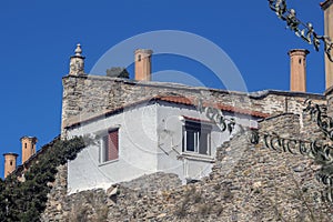The Architecture of Kavala - Detail. House over part of the fortress wall. Greece.