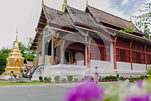 Architecture and landscape around Lai Kham Chapel of Buddhist temple in Chiang Mai photo