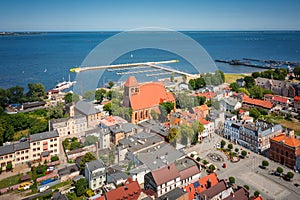 Architecture of the market square of Puck  town at summer, Poland photo