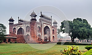 Nice architecture detailing of the entrance gate of famous Tajmahal, Agra, India. photo