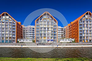 Architecture of modern apartments at Motlawa river in Gdansk