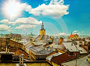 The architecture of the old city, roofs of houses and the church