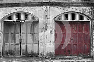 Architecture old purple wooden door with vintage buildings.