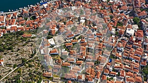 Architecture of Porose island in Greece. tiled roofs of the old European city. Aerial video footage