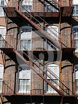 Architecture: rusty steel fire escape v