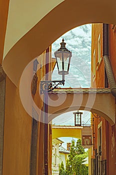 Architecture shows curved arches and lamplights with peek holes to the sky.