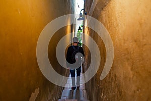 The architecture of the strago city of Prague. The narrowest street in Europe. The passage between buildings for one person,