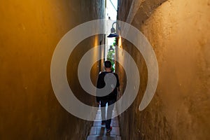 The architecture of the strago city of Prague. The narrowest street in Europe. The passage between buildings for one person,