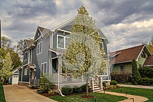 Architecture of suburban neighborhood. cottage house in american neighborhood. suburban house property. property