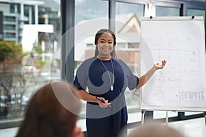 Architecture, woman and blueprint in presentation with discussion, training or meeting on building project. Black person