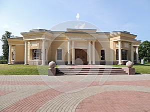 Architecture yellow building with columns entrance stairs