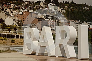 Architectures and sea of Bariloche behind the first 4 letters of Bariloche word design