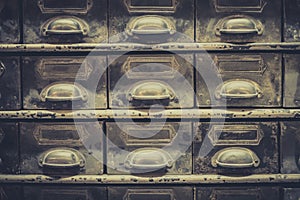 Archive concept, vintage library drawer closeup, retro filter