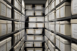 Archive evidence police depository cardboard box black shelves with white office boxes card