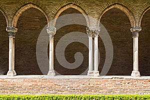 Archs in the Cloister of Toulouse Cathedral, France photo