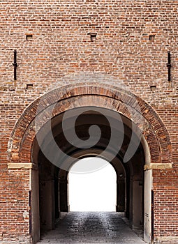 Archway in the ancient brick fortress wall