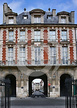 Archway entrance to the Place des Vosges in Paris