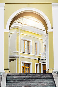 Archway entrance in the yard building staircase.