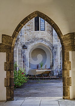 Archway Leading to Courtyard at The Friars