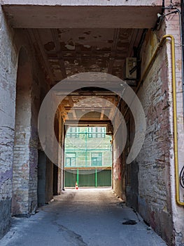 Archway through old building in the center of Kyiv city, Ukraine