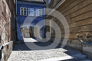 Archway at tenement house in Warsaw.