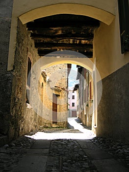 Archway Tuscan village Italy photo