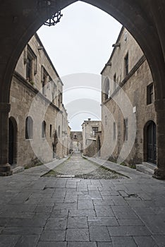 Archway view down the street of Knights Of Saint John Rhodes old town