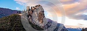 Arco castle on rocky cliff horizontal background of Trentino Alto adige - Trento - Italy landmarks