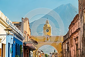 Arco de Santa Catalina and Volcan de Agua in Antigua Guatemala, Central America photo