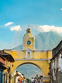 Arco de Santa Catalina and Volcan de Agua in Antigua Guatemala, Central America photo