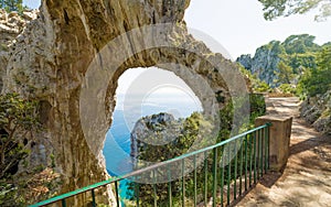 Arco Naturale is natural arch on coast of island of Capri, Italy