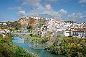 Arcos de la Frontera view with Guadalete River and San Miguel Bridge - Arcos de la Frontera, Cadiz, Spain photo