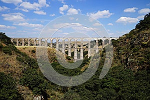 Arcos del Sitio Arcos Site historic aqueduct in Tepotzotlan, Mexico photo